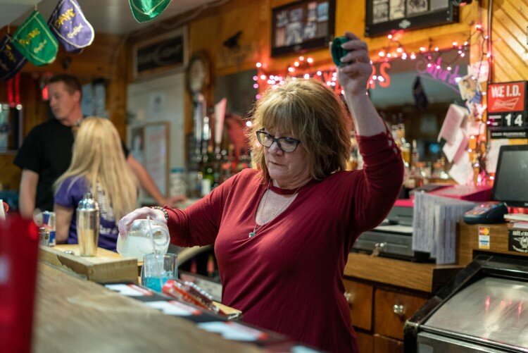 Ryder's staff work to fill drink orders for a Friday night crowd