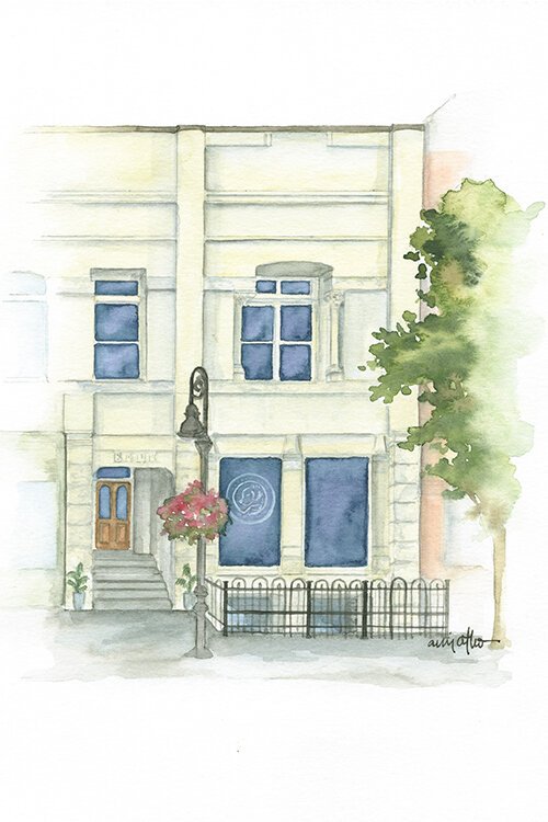 Watercolor concept image of the exterior of Sleepy Dog Books located at 120 E. Broadway St. in downtown Mt. Pleasant.