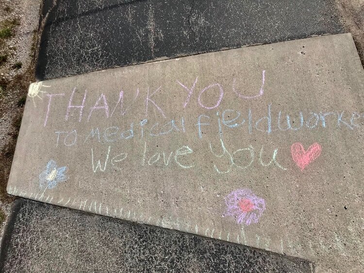 A sidewalk chalk message from Baker’s twins made during their time off.
