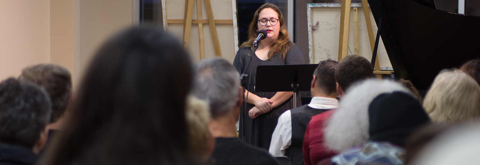 Liz O'Donnell joined professional poet Marc Hudson as the student reader at last month's event
