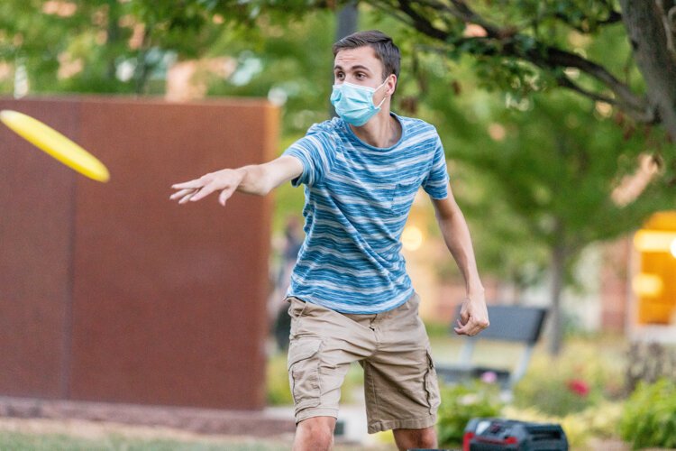 Chi Alpha Central Michigan University chapter member Joel Robinson, 18, of Fenton, plays Kan Jam at the fraternity’s welcome event on CMU’s campus.