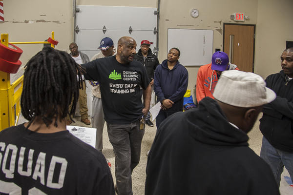Students listen to an instructor at the Detroit Training Center.