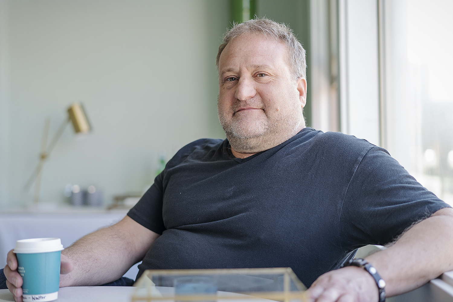 Flint, MI - Tuesday, May 8, 2018: Flint resident and Flint Trading Company founder Robert McAdow has his portrait taken at the Flint Trading Company showroom.