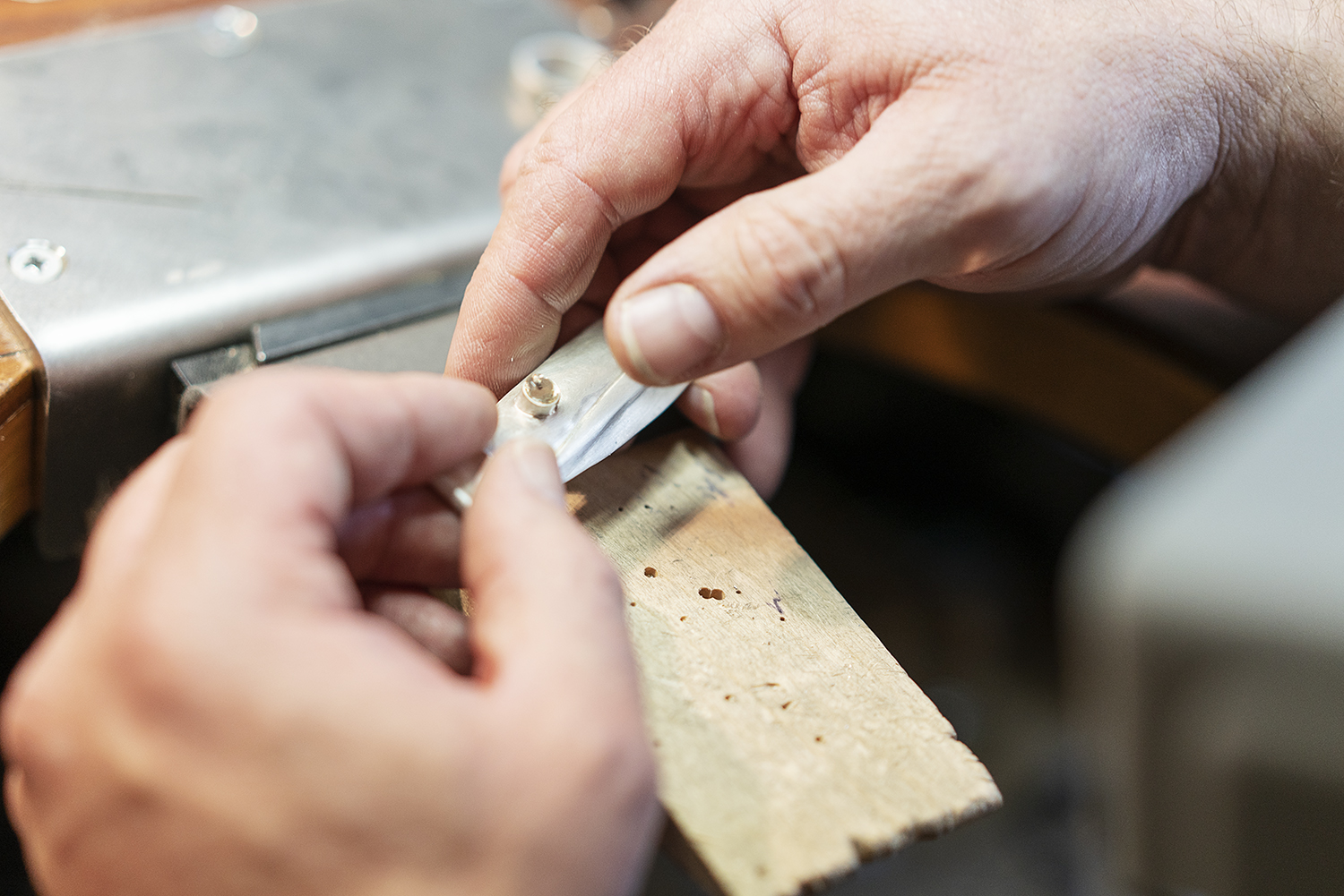 Flint, MI - Tuesday, May 8, 2018: Metalsmith and Flint resident Robert McAdow works on creating a setting for a pendant he has been working on.