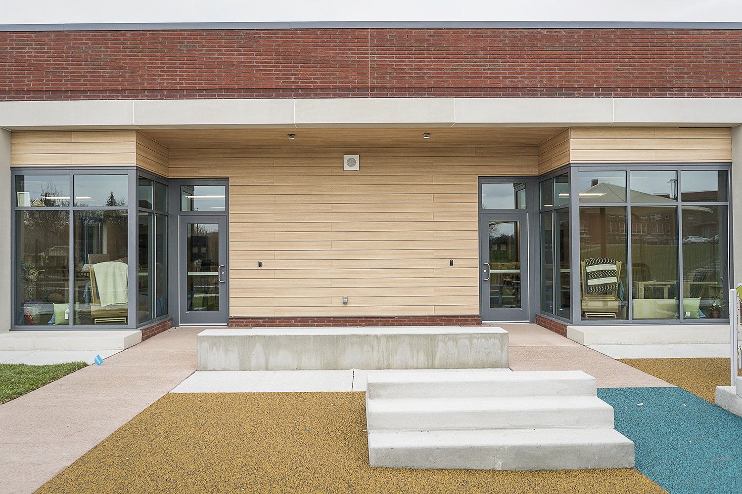 Flint, MI - Tuesday, November 21, 2017: A multicolored play area connects two classrooms at the new Educare Center in Flint.