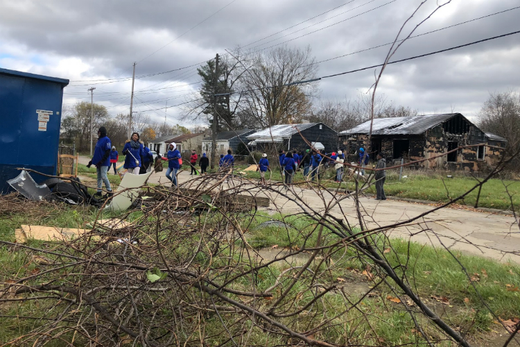 Weeds and debris is piled up, but soon will be whisked away by volunteers in the Lots of Love, Lots of Life cleanup Nov. 10, 2018.