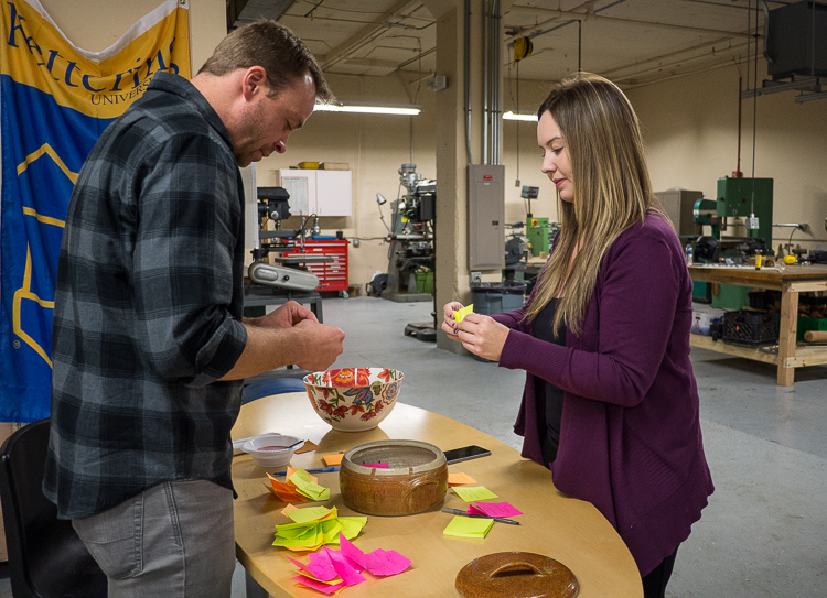 Flint SOUP co-leaders James Shuttleworth and Adrian Montague tally up the votes from the "taco bowl of fate" to determine the winner of Flint SOUP's October 2017 microgrant.