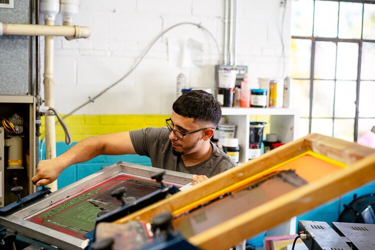 For David Camarena, training the next generation of screen printers seems to be about giving young people in his community a positive career path to focus on instead of the darker road that he once briefly wandered down.