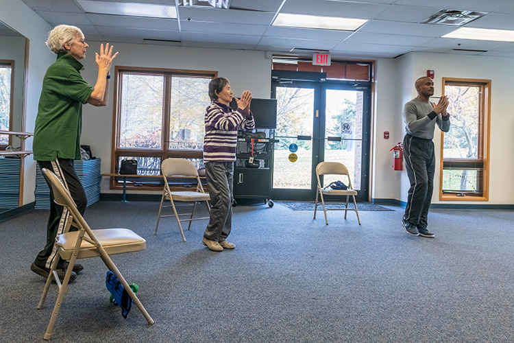 Paul Clark leads an enhanced fitness class at Turner Senior Resource Center.