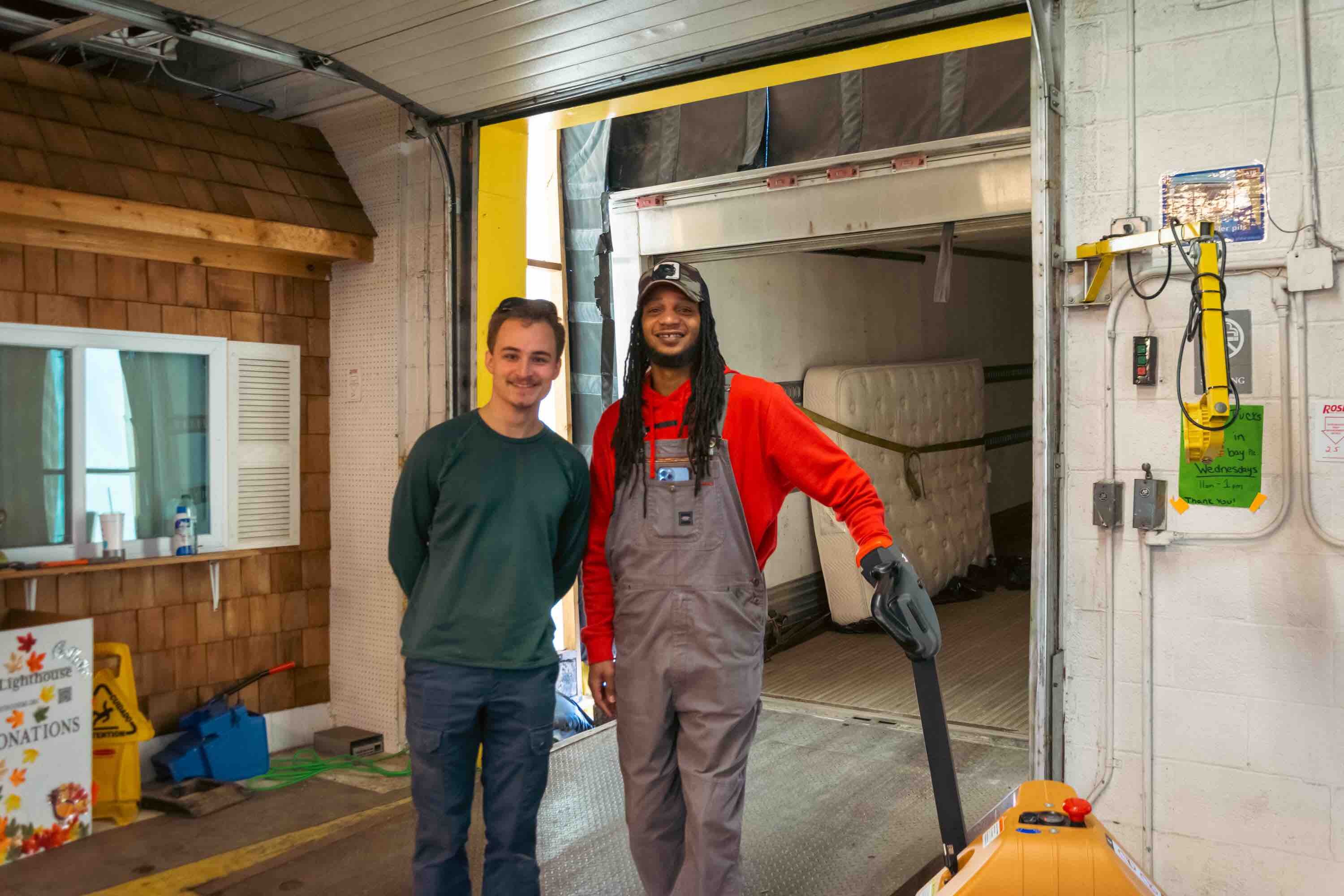 Will Sargent, warehouse stock clerk (left) and Keonte Stephens, truck driver and warehouse coordinator