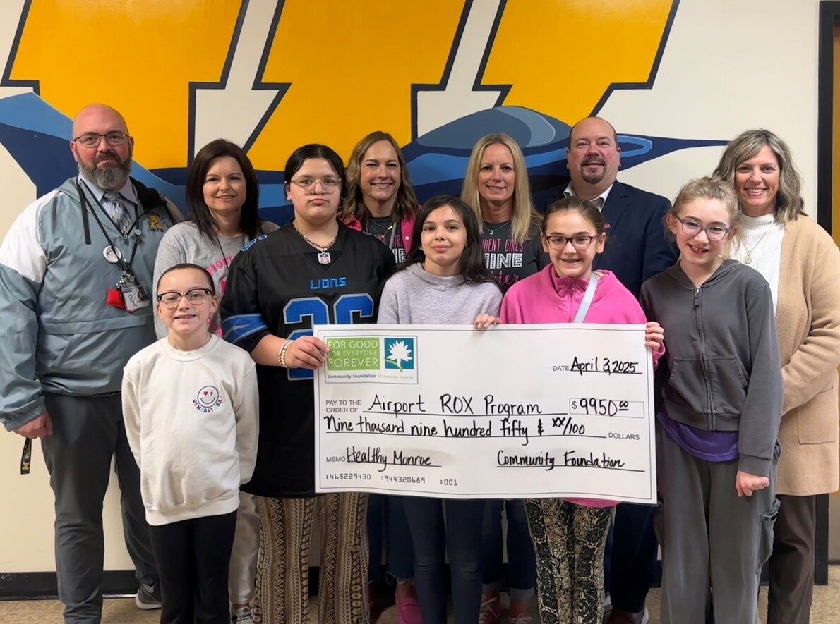 Valerie Orr (right) with Airport Middle School staff and ROX program members
