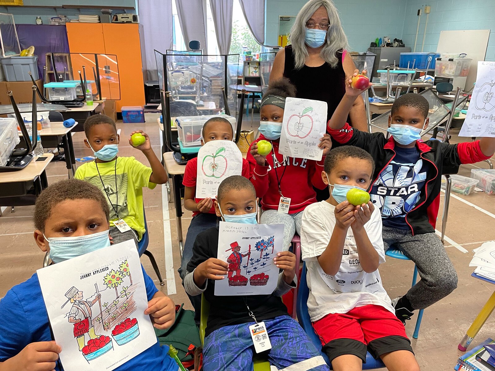 Students at Flint's Brownell STEM Academy participate in MI Apple Crunch Day.