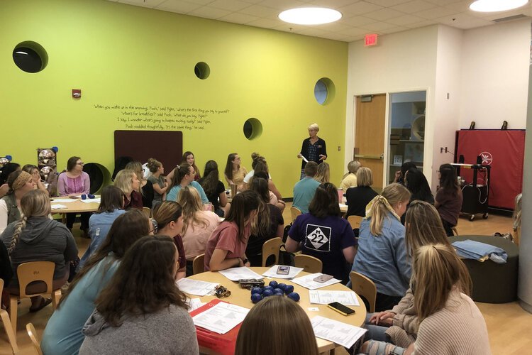 Alison Arnold gives a presentation on trauma-informed care to CMU's Association for the Education of Young Children.