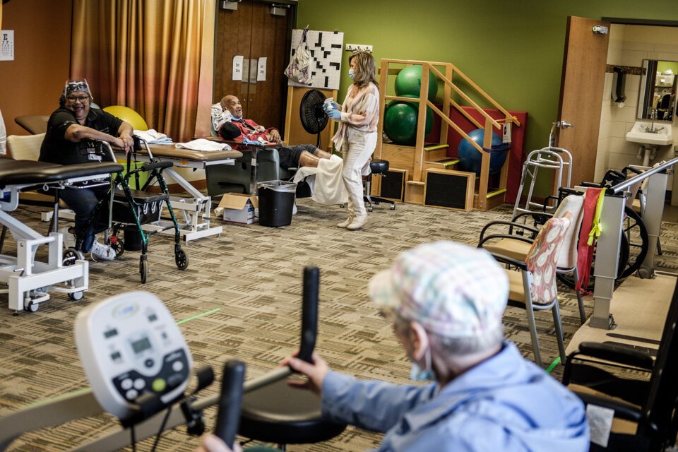 A PACE participant uses an exercise bike at the LifeCircles Center in Muskegon. PACE participants are encouraged to stay active and move their bodies with low-impact exercise, keeping them mobile and independent for longer.