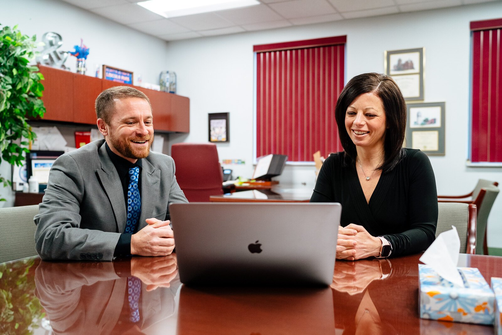 Terry Dangerfield, superintendent of Lincoln Park Public Schools, talks with Nicole Chubb, the district's executive director of special education. The district received funding from Michigan's Education Equity Fund.