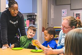 Head Start students at St. John's Universal Church of Christ in Jackson learn about cucumbers and dragonfruit in a lesson on mindful eating.