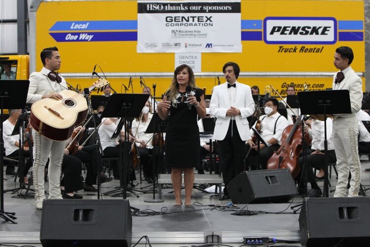 Ottawa County 58th District Court Judge Juanita Bocanegra speaks to guest attending the Holland Symphony Orchestra’s “Mariachi & the Movies” community concert, featuring Mariachi Garibaldi de Jaime Cuéllar of Los Angeles, California, at M.E. Yacht Re