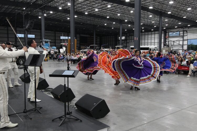 Members of Ballet Folklórico Sol Azteca dance to the song “Guadalajara”, being performed by Luis Zambrano and Mariachi Garibaldi de Jaime Cuéllar of Los Angeles, California, during the Holland Symphony Orchestra’s “Mariachi & the Movies” community co
