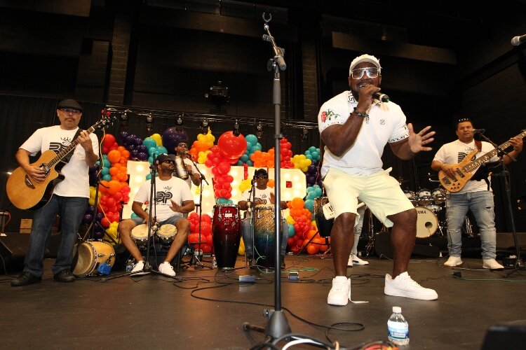 Bacha Popi performs at the LAUP ¡Fiesta! in the Holland Civic Center July 9.