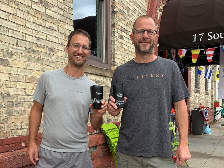 Andrew Boyd and Jeremy Miller outside the Grand Haven Armory.
