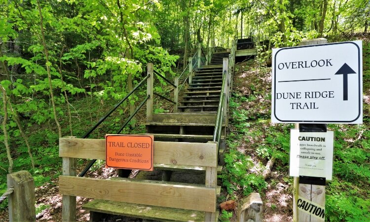 An eroding dune forces the closure of the ridge trail at Kirk Park.