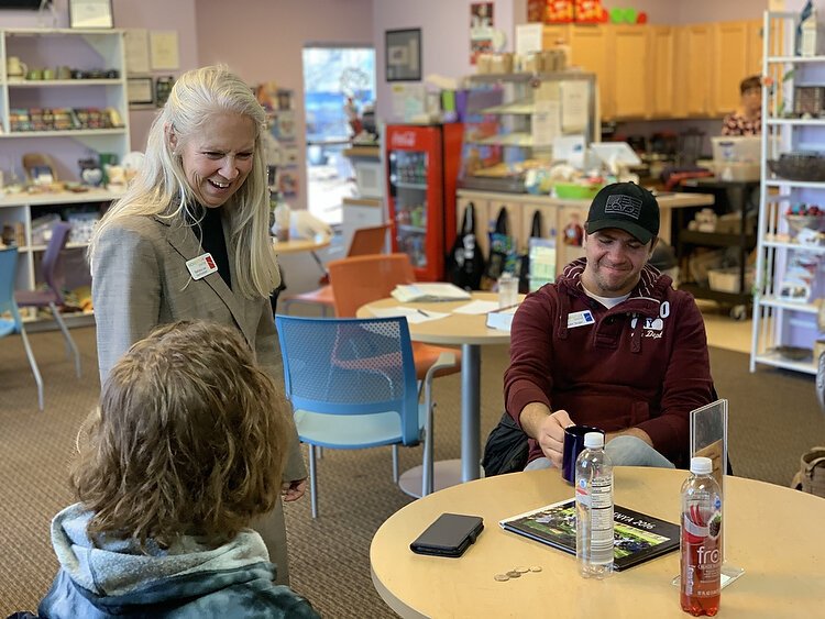 Barbara Lee VanHorssen talks to members of the Momentum Center in Grand Haven. A version of the program is being piloted in Holland.