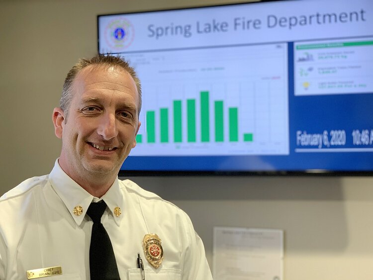 Fire Chief Brian Sipe stands in the lobby of the Spring Lake Fire Department.