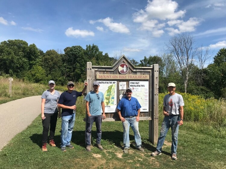 DISHER employees volunteer as a trail crew.