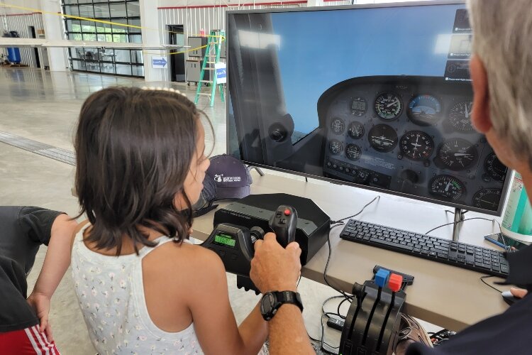 Flight Path offered flight simulator experiences during Aviation Day at the West Michigan Regional Airport, Saturday, Aug. 20, 2022.