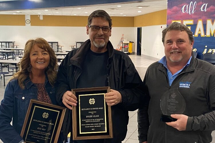 This year’s Excellence in Service Award winners includes science teacher Roger Glass, secretary Rita Way, and volunteer Randy Poel.