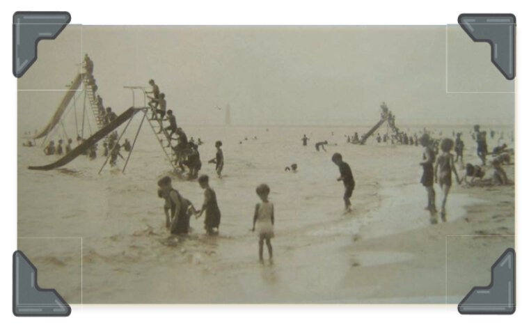 The bath house and giant slides at Highland Park beach (1915).
