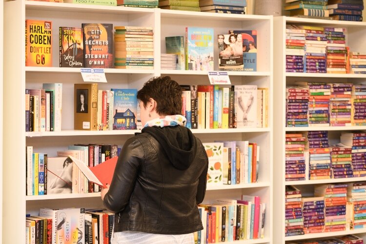 The new space features accessible aisles, flexible seating, event rooms, family-friendly amenities, and expanded shelves for community partnerships.