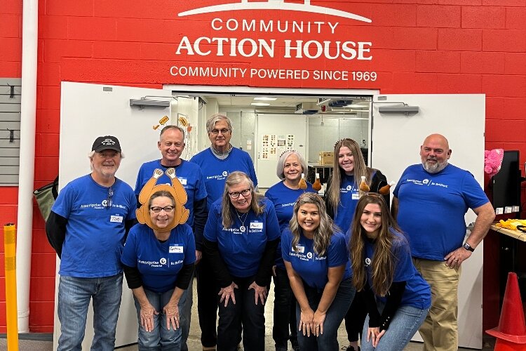 For the last decade, employees from Ameriprise have volunteered with Community Action House to help prepare food for Thanksgiving distribution. 