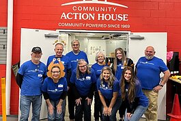 For the last decade, employees from Ameriprise have volunteered with Community Action House to help prepare food for Thanksgiving distribution. 