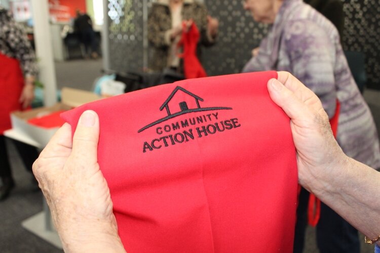 The senior volunteers sewed the aprons for the Community Action House clients. (CAH)