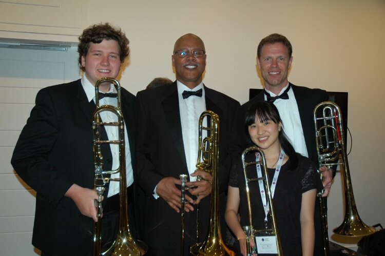 Dr. Nesbary with the West Michigan Concert Winds trombone section during a 2016 performance at Carnegie Hall.