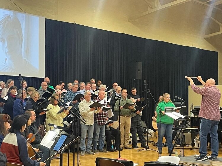 The Holland Chorale rehearses "Considering Matthew Shepard" concert.