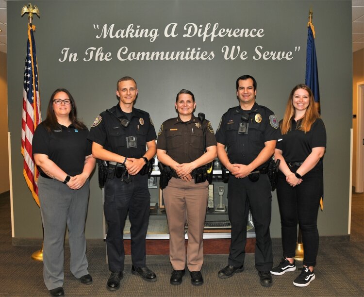 The Ottawa County Crisis Intervention Team includes law enforcement officers as well as mental health professionals. From left: Amanda Sheffield, Dylan Ousley, Michele Sampson, Austin Engerson, and Frankie Bader.