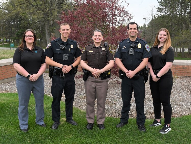 The Ottawa County Crisis Intervention Team, from left: Amanda Sheffield, Dylan Ousley, Michele Sampson, Austin Engerson, and Frankie Bader.