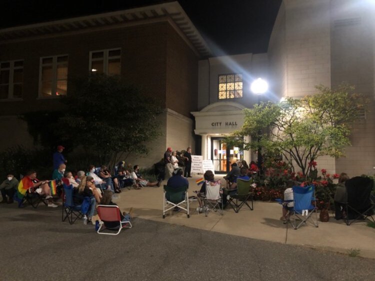 A crowd outside the Holland City Hall Aug. 19 waits to hear how the city council would vote on a LGBTQ rights ordinance.