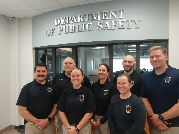 Holland is one of a few police departments to use community policing units. From left: Sgt. John Weatherwax, officers Joe Soto, Anna Heintzleman, Joy Nelson, Derek Barrett, Nicole Hamberg, and Brian Spykerman.