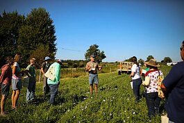 Mike Brokema of Shady Side Farms Inc. leads a discussion on soil health at his farm as part of the 2022 Cultivating Resilience Field Day.