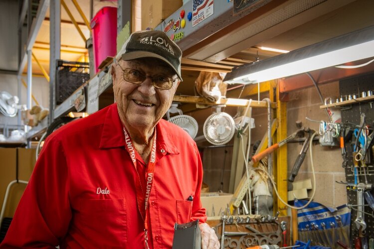 Volunteer Dale Yntema salvages recyclables.