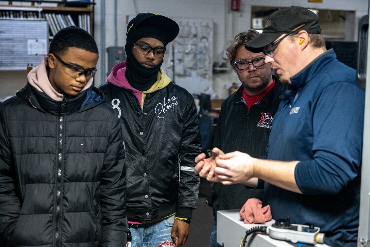 Students take a tour of a manufacturing facility during Discover Manufacturing Week. (West Michigan Works!)