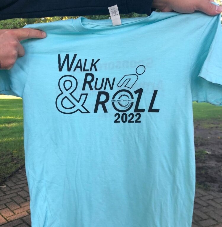 DNL’s associate board organized the group’s first Walk, Run, & Roll 5K through downtown Holland. 