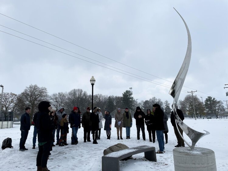 The Doss family dedicates a sculpture it donated to the Lakeside Trail.