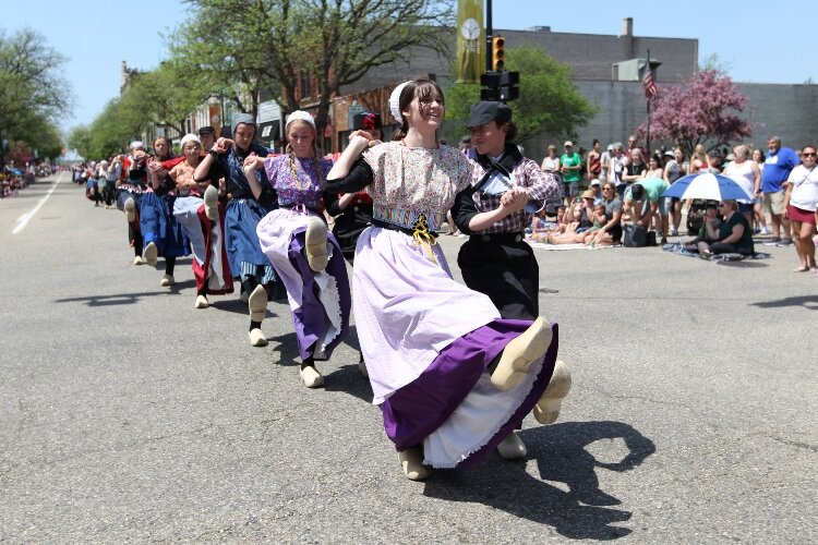 Klompen Dancers of Holland High School perform in downtown Holland before the Tulip Time Festival’s Kinderparade on May 12.