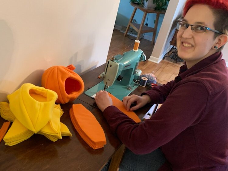 Tate Shumaker has an Etsy side hustle making habitats for pets.  Their store, Tatescosycreatures, features adorable hideaways shaped like fruits and vegetables for pet hamsters, guinea pigs, and rats.