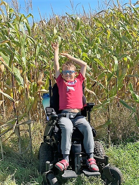 Fifth-grader Evan Weesies's all-terrain wheelchair gives him the mobility to move around his farm.