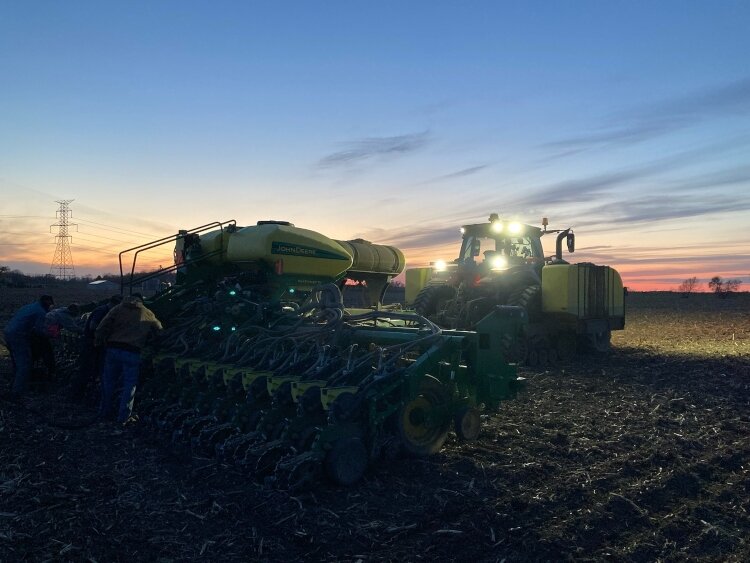 The Kruithoff family works on their Ottawa County farm, planting a test plot of different varieties of soybeans for a seed company.